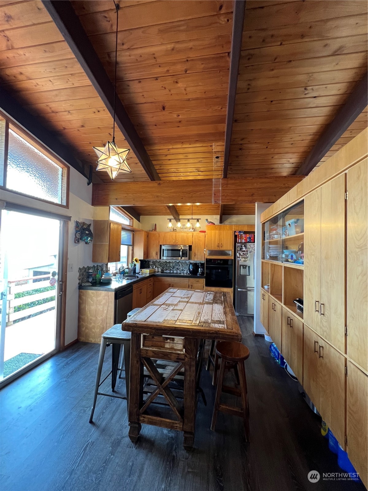 1053 Shorey Road Chehalis, WA 98532 - Photo 7 of 39 a view of a dining room with furniture window and wooden floor