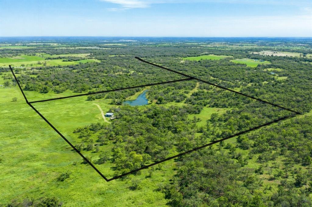 Tbd Tbd Cr-1990 Chico, TX 76431 - Photo 1 of 26 a view of a field with an ocean