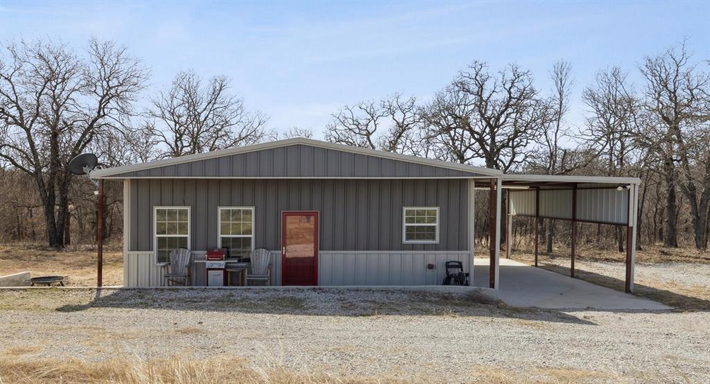 Tbd Tbd Cr-1990 Chico, TX 76431 - Photo 16 of 26 a view of a house with a yard and large tree