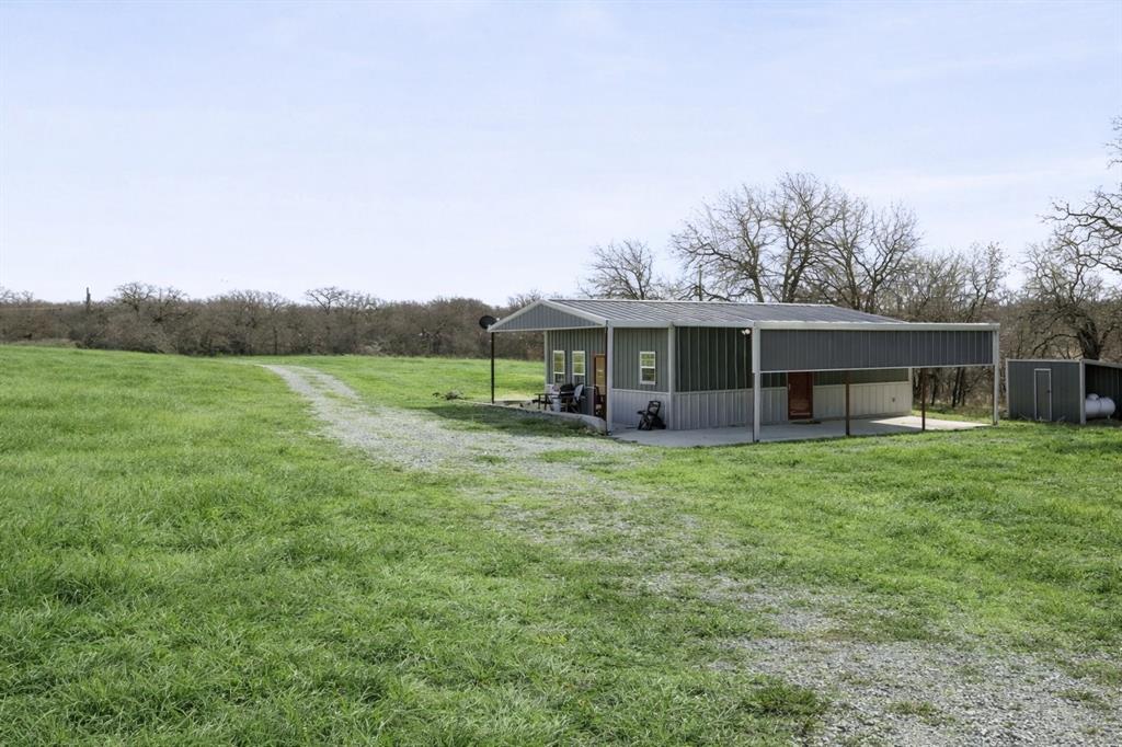 Tbd Tbd Cr-1990 Chico, TX 76431 - Photo 17 of 26 a view of a house with a backyard