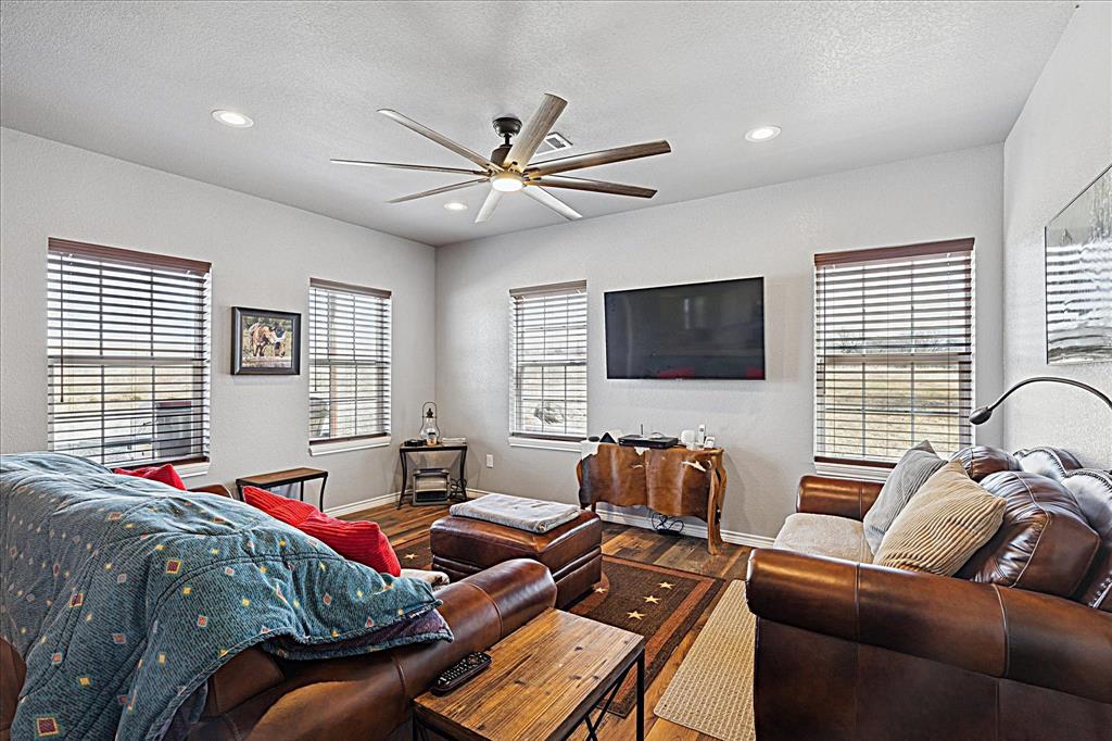 Tbd Tbd Cr-1990 Chico, TX 76431 - Photo 18 of 26 a living room with furniture and a flat screen tv