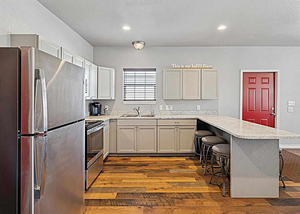Tbd Tbd Cr-1990 Chico, TX 76431 - Photo 20 of 26 a kitchen with a refrigerator sink and cabinets