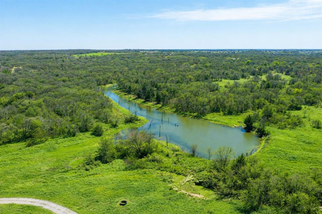 Tbd Tbd Cr-1990 Chico, TX 76431 - Photo 2 of 26 a view of a lake with a yard