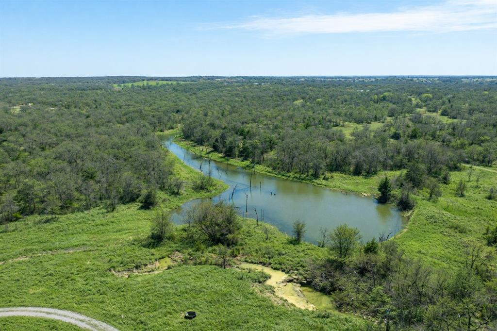 Tbd Tbd Cr-1990 Chico, TX 76431 - Photo 25 of 26 a view of a lake with a building in the background