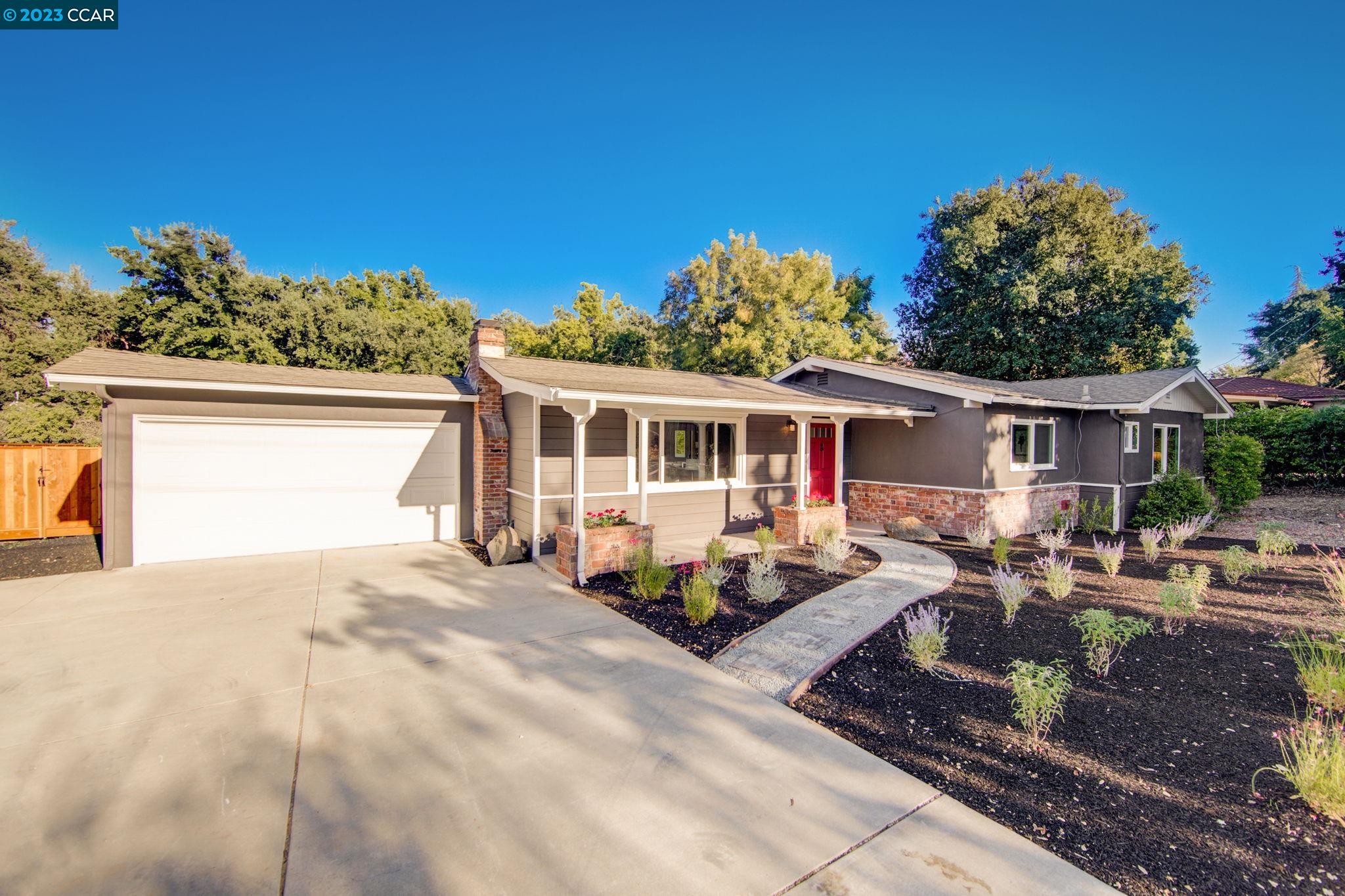 24 Vía Los Ninos Walnut Creek, CA 94597 - Photo 1 of 1 a front view of a house with a sitting area