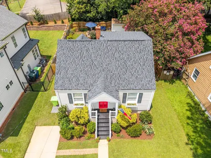 an aerial view of a house with swimming pool