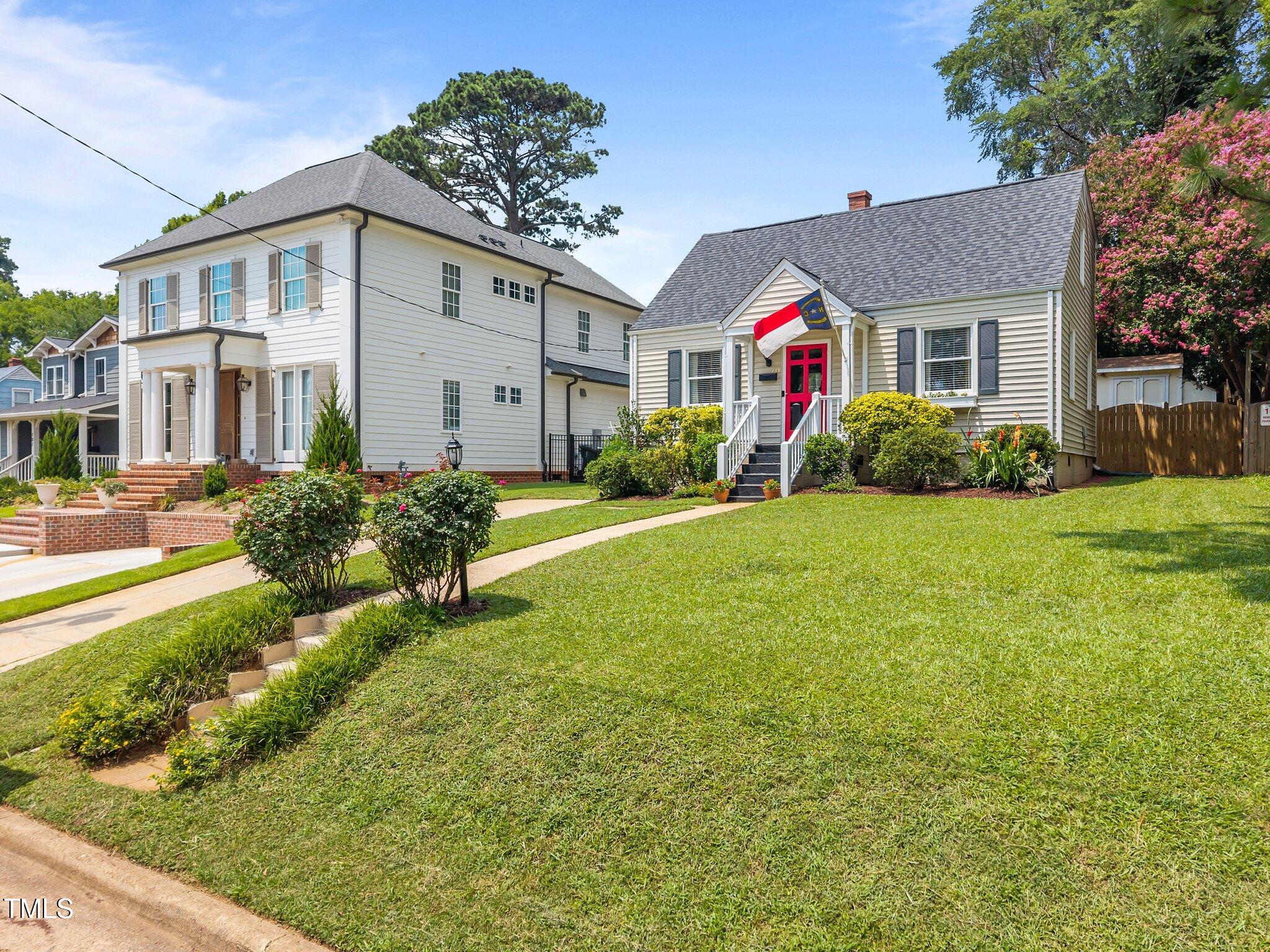 711 New Road Raleigh, NC 27608 - Photo 44 of 54 a view of house with yard and green space