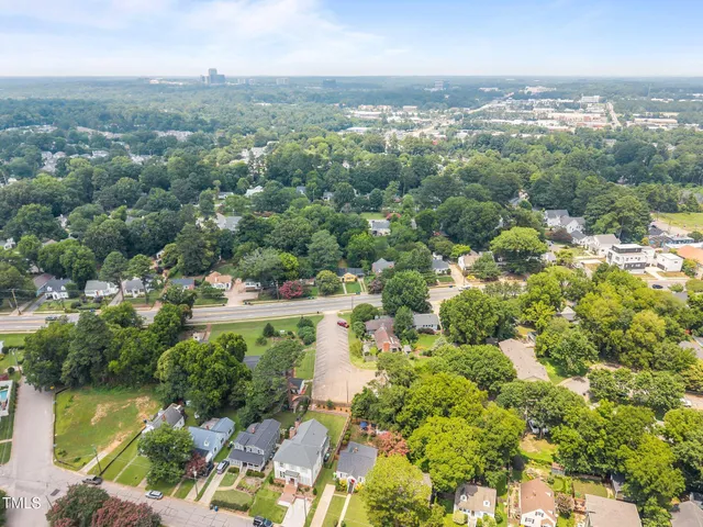 a view of yard and swimming pool