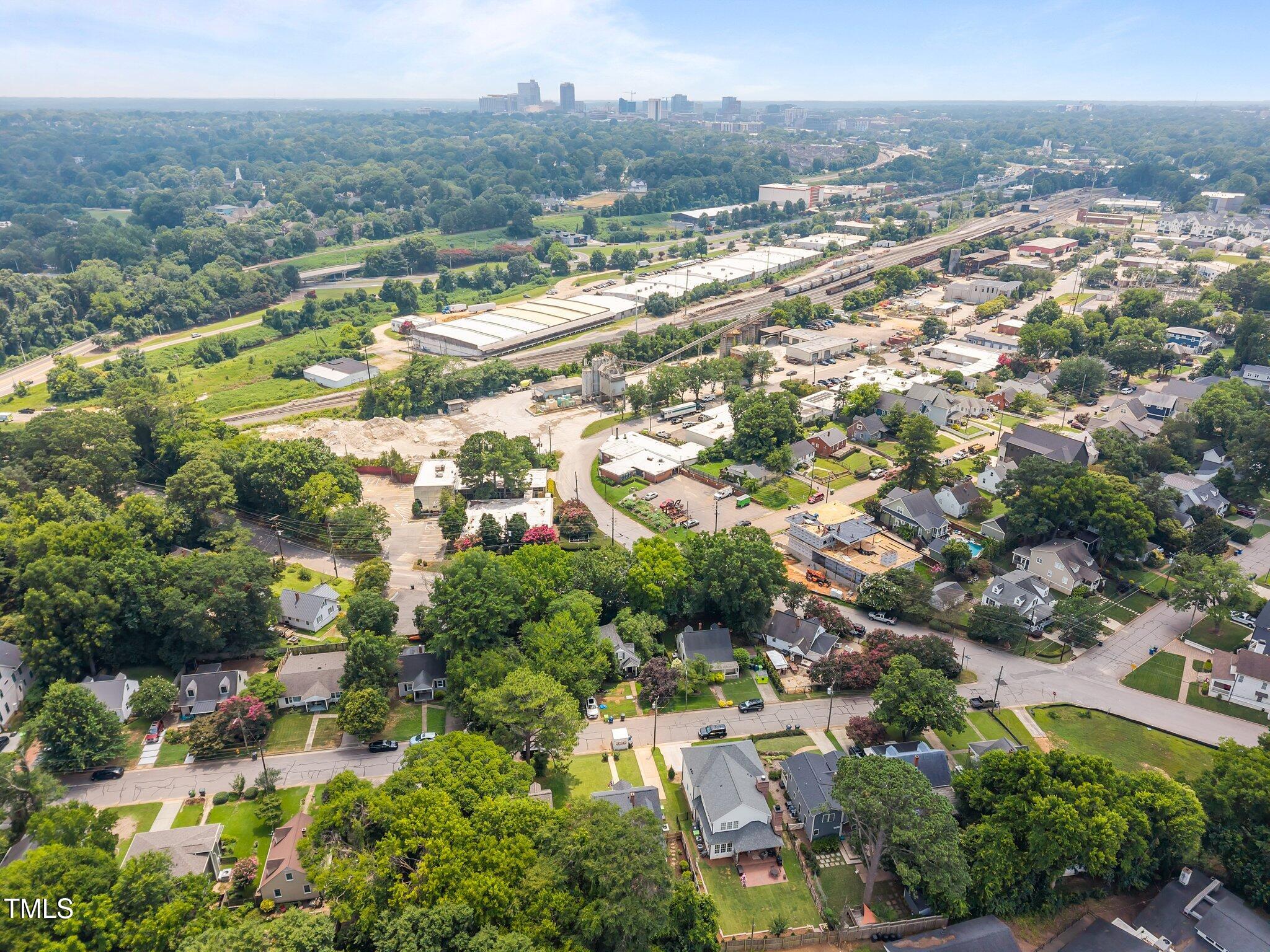 711 New Road Raleigh, NC 27608 - Photo 48 of 54 an aerial view of residential houses with outdoor space