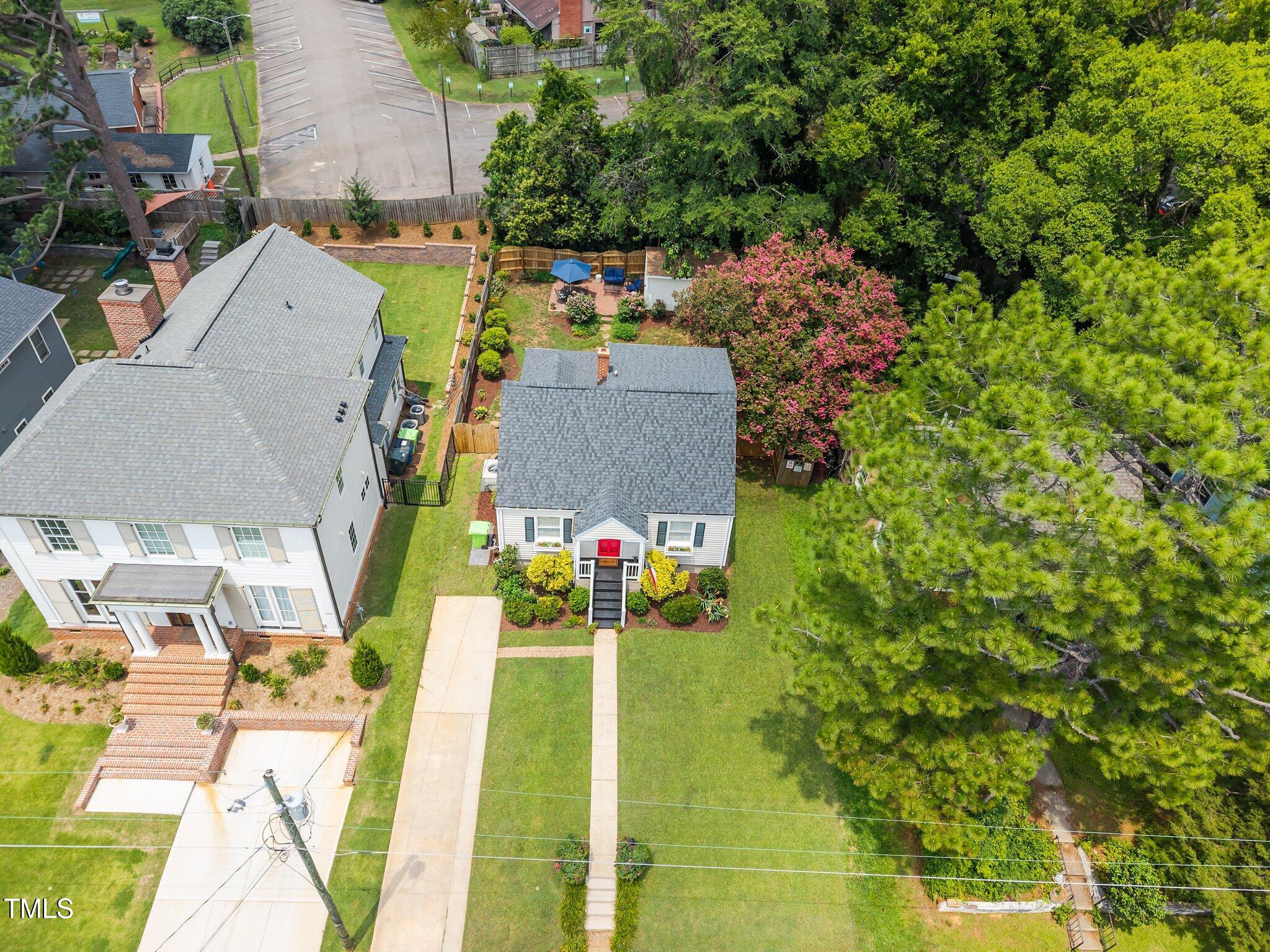 711 New Road Raleigh, NC 27608 - Photo 50 of 54 a view of yard and swimming pool