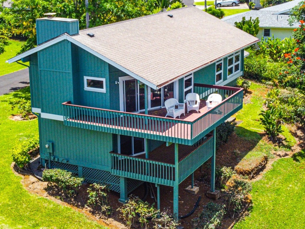 aerial view of a house with a deck