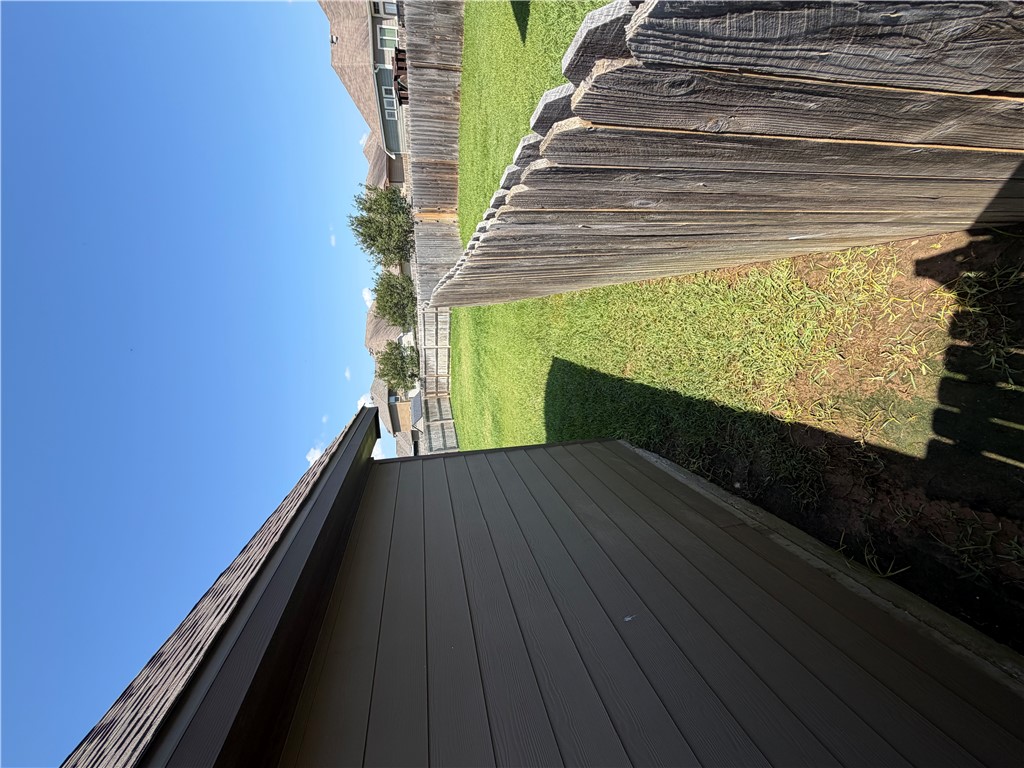 3087 Positano Loop Bryan, TX 77808 - Photo 4 of 14 Additional side view of Home and back yard.