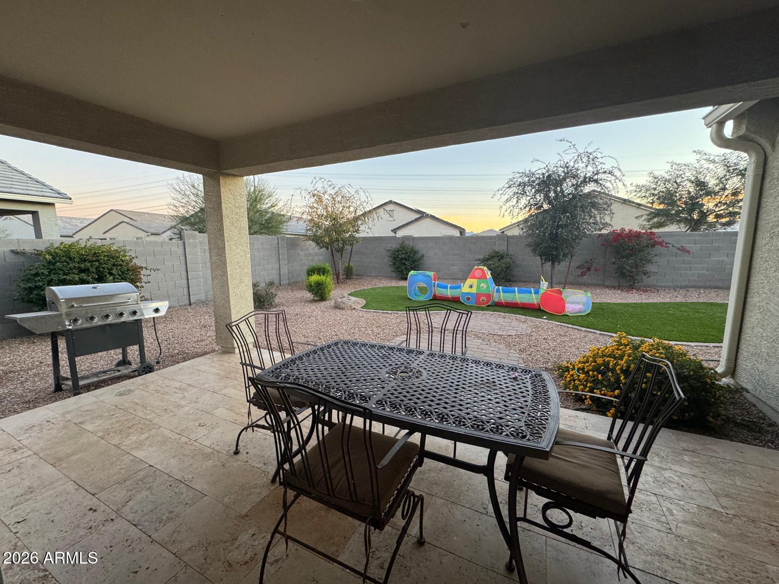 7851 West Riverside Avenue Phoenix, AZ 85043 - Photo 14 of 40 a view of an outdoor dining space with furniture and outdoor view