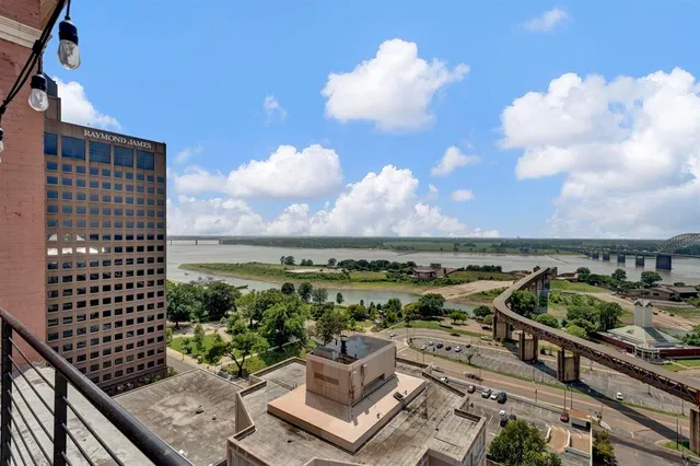 a patio with a table and chairs