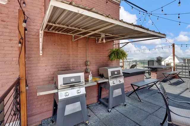 a kitchen with a table and chairs