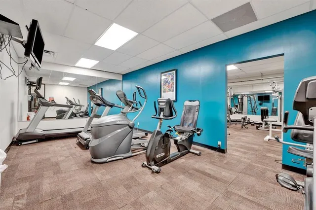 a view of a room with gym equipment