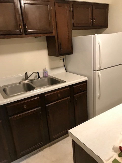 149 Madison Road Clarion, PA 16214 - Photo 20 of 39 a kitchen with a sink and a refrigerator