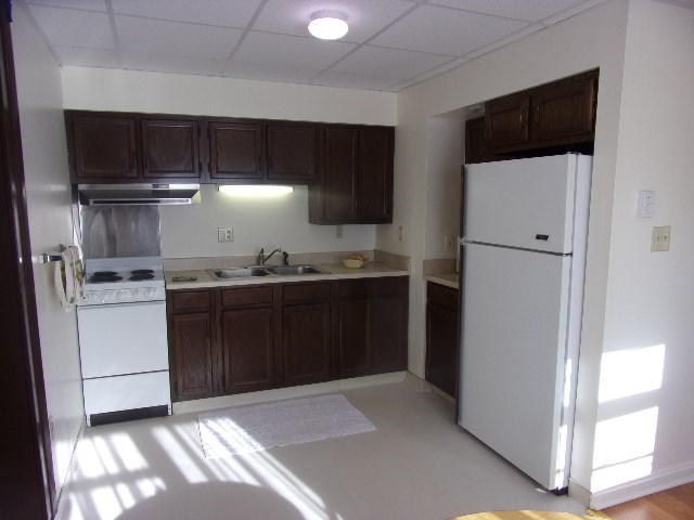 149 Madison Road Clarion, PA 16214 - Photo 23 of 39 a kitchen with a refrigerator and a stove