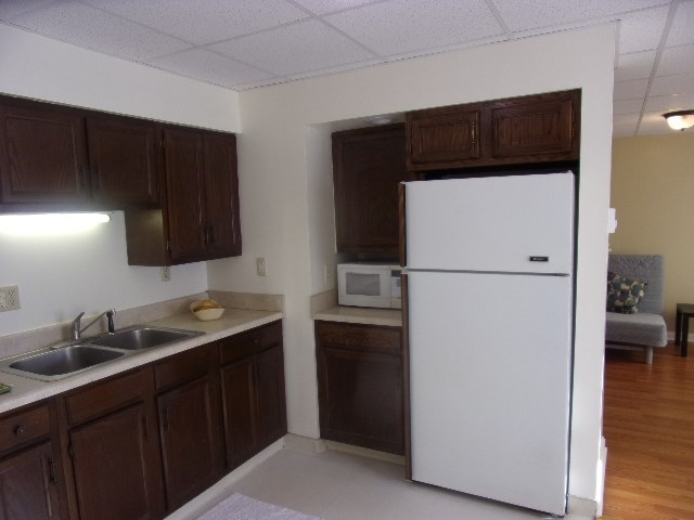 149 Madison Road Clarion, PA 16214 - Photo 27 of 39 a kitchen with a refrigerator and a sink