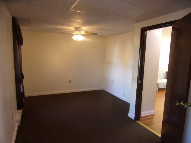 149 Madison Road Clarion, PA 16214 - Photo 30 of 39 an empty room with wooden floor and windows