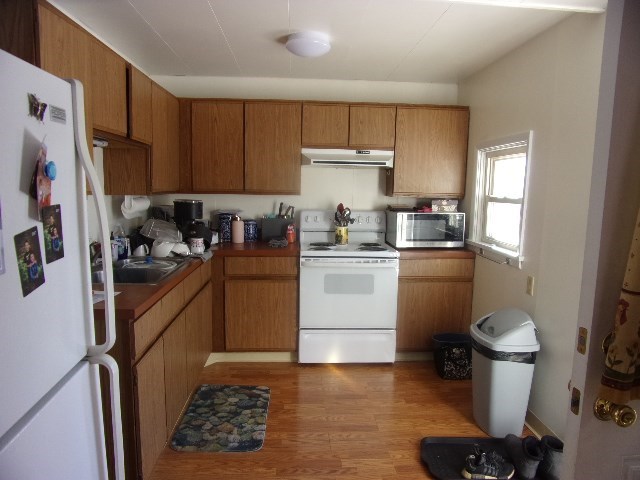 149 Madison Road Clarion, PA 16214 - Photo 33 of 39 a kitchen with a sink stove and refrigerator