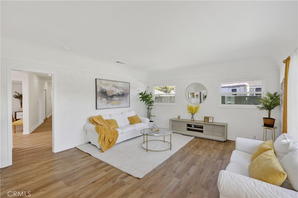 1049 Second Street Norco, CA 92860 - Photo 17 of 66 a living room with furniture and wooden floor
