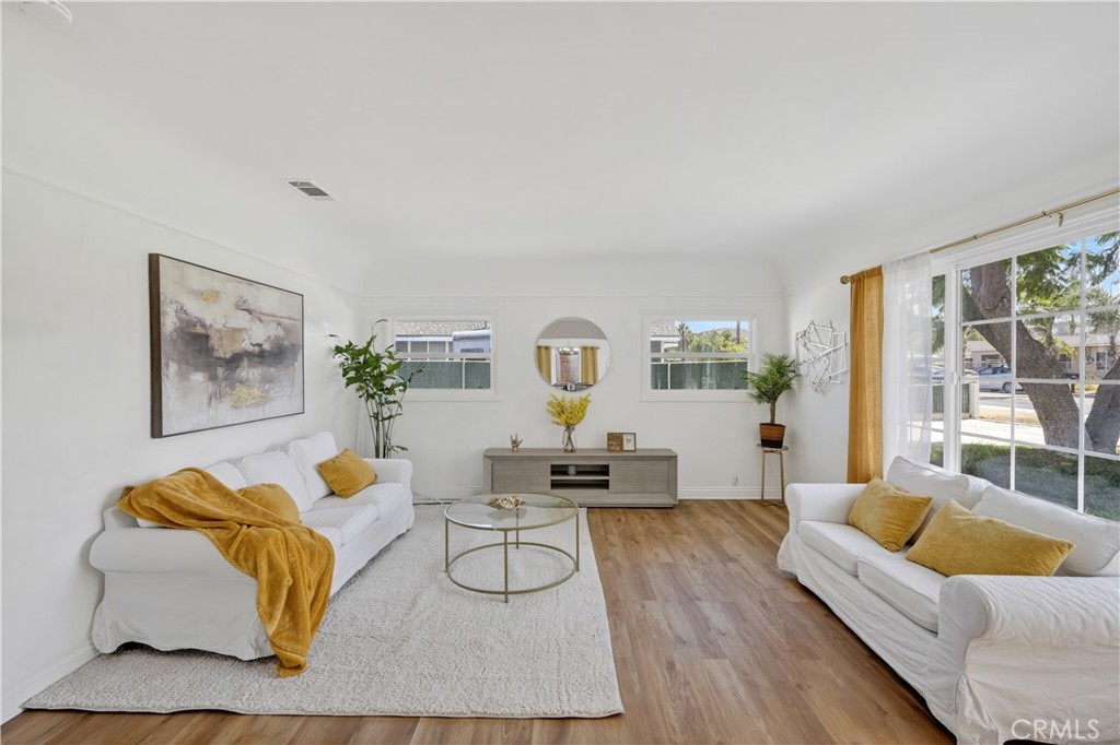 1049 Second Street Norco, CA 92860 - Photo 19 of 66 a living room with furniture and a window