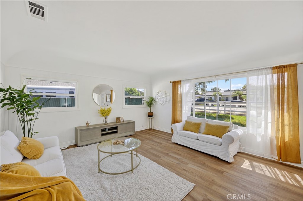 1049 Second Street Norco, CA 92860 - Photo 20 of 66 a living room with furniture and a potted plant