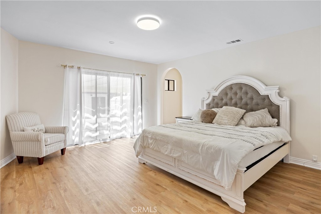 1049 Second Street Norco, CA 92860 - Photo 33 of 66 a bedroom with a bed and a couch