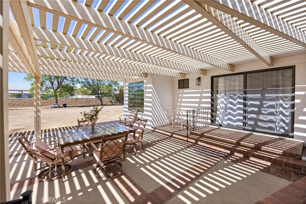 1049 Second Street Norco, CA 92860 - Photo 43 of 66 a view of a patio with wooden floor