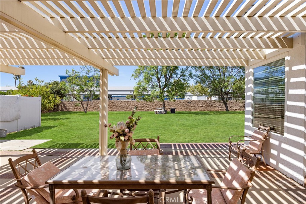 1049 Second Street Norco, CA 92860 - Photo 46 of 66 a view of backyard with a garden and outdoor seating