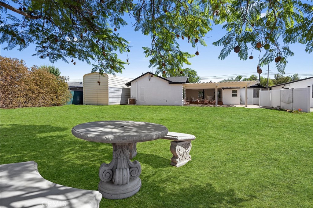 1049 Second Street Norco, CA 92860 - Photo 54 of 66 a view of a house with backyard