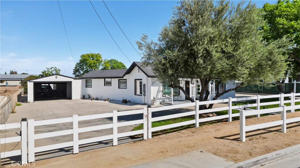 1049 Second Street Norco, CA 92860 - Photo 9 of 66 a view of a house with wooden fence
