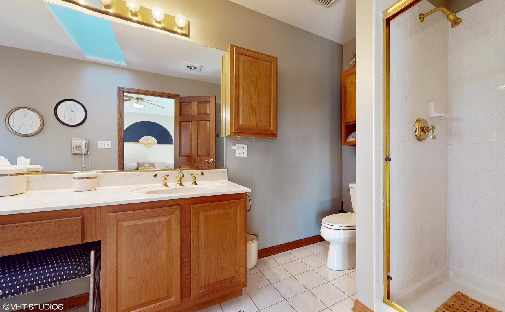 1640 Newton Avenue Park Ridge, IL 60068 - Photo 20 of 50 a bathroom with a sink a toilet and a mirror