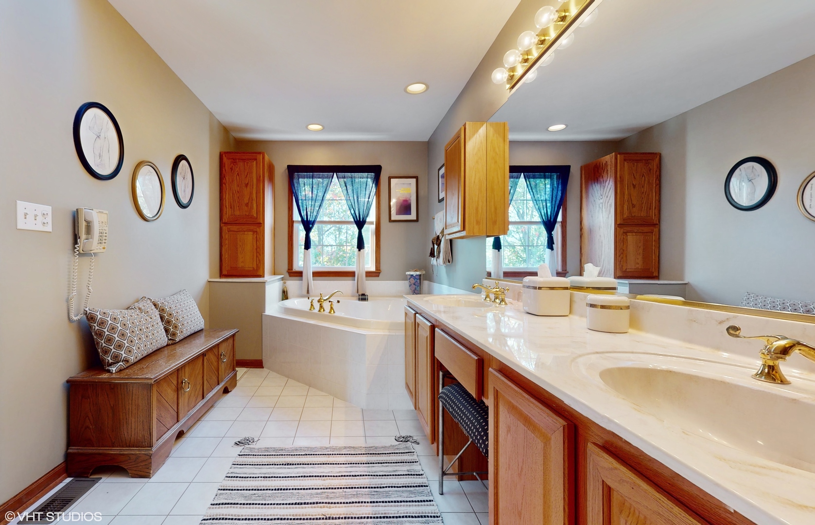 1640 Newton Avenue Park Ridge, IL 60068 - Photo 21 of 50 a spacious bathroom with a granite countertop sink and a large mirror