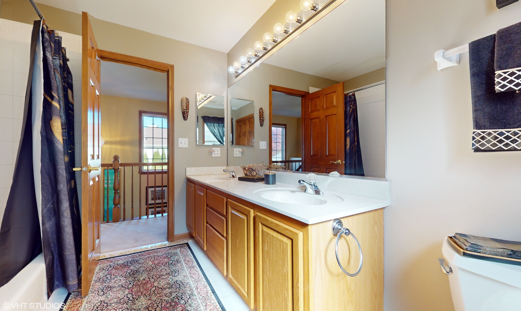1640 Newton Avenue Park Ridge, IL 60068 - Photo 29 of 50 a bathroom with a sink vanity mirror and a toilet
