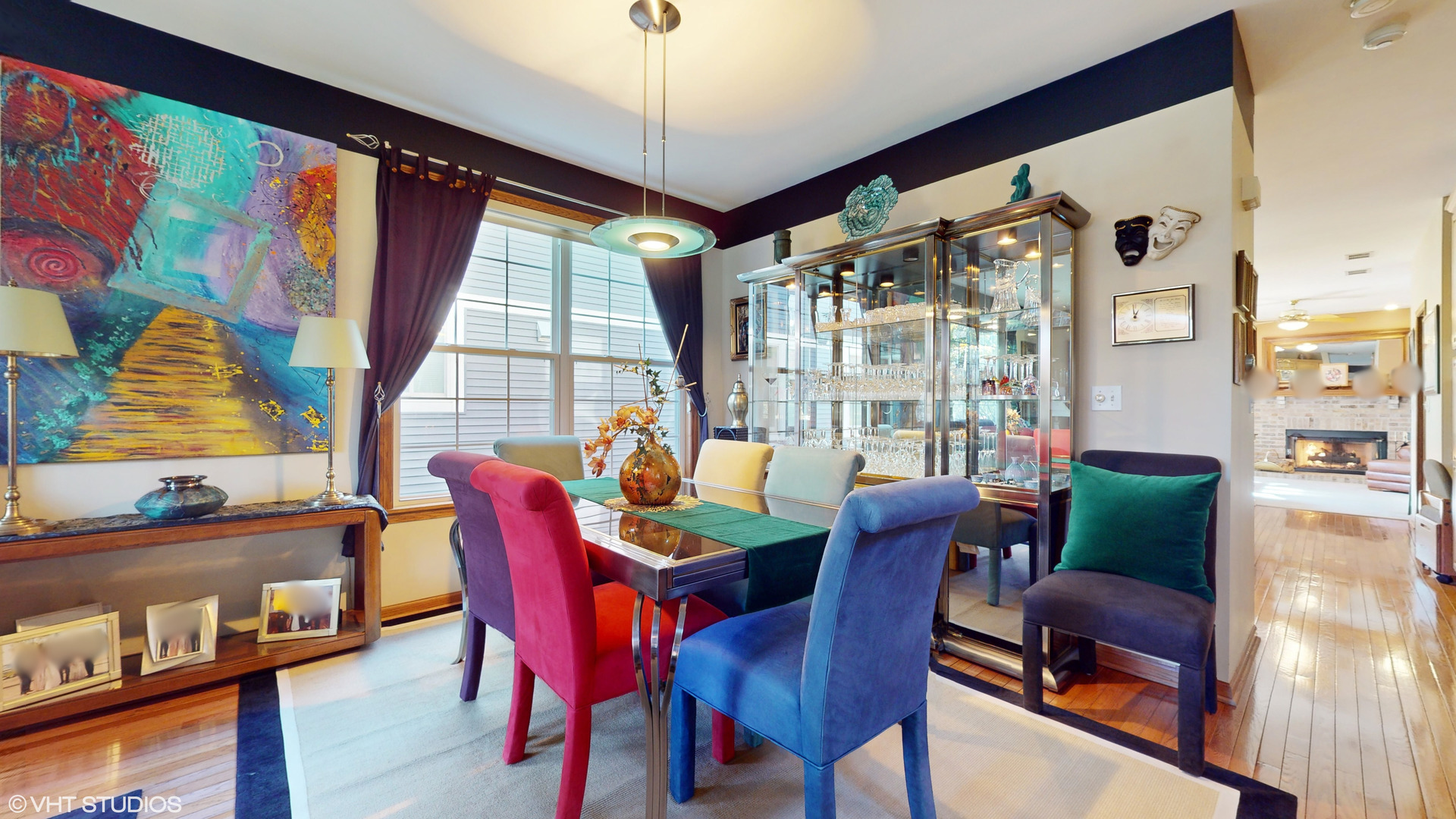 1640 Newton Avenue Park Ridge, IL 60068 - Photo 5 of 50 a dining room with furniture a flat screen tv and a large window
