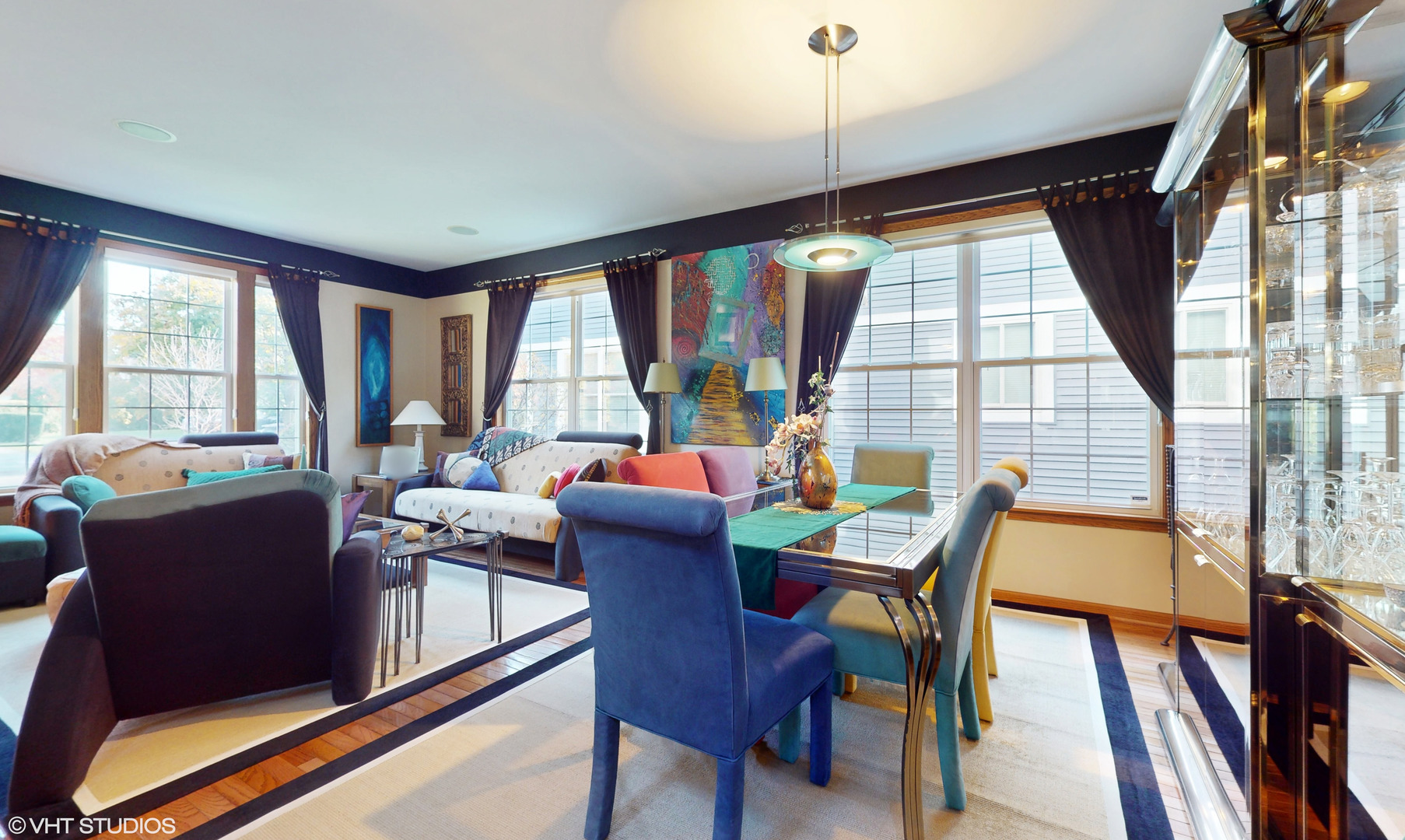 1640 Newton Avenue Park Ridge, IL 60068 - Photo 6 of 50 a view of a dining room with furniture large windows and wooden floor