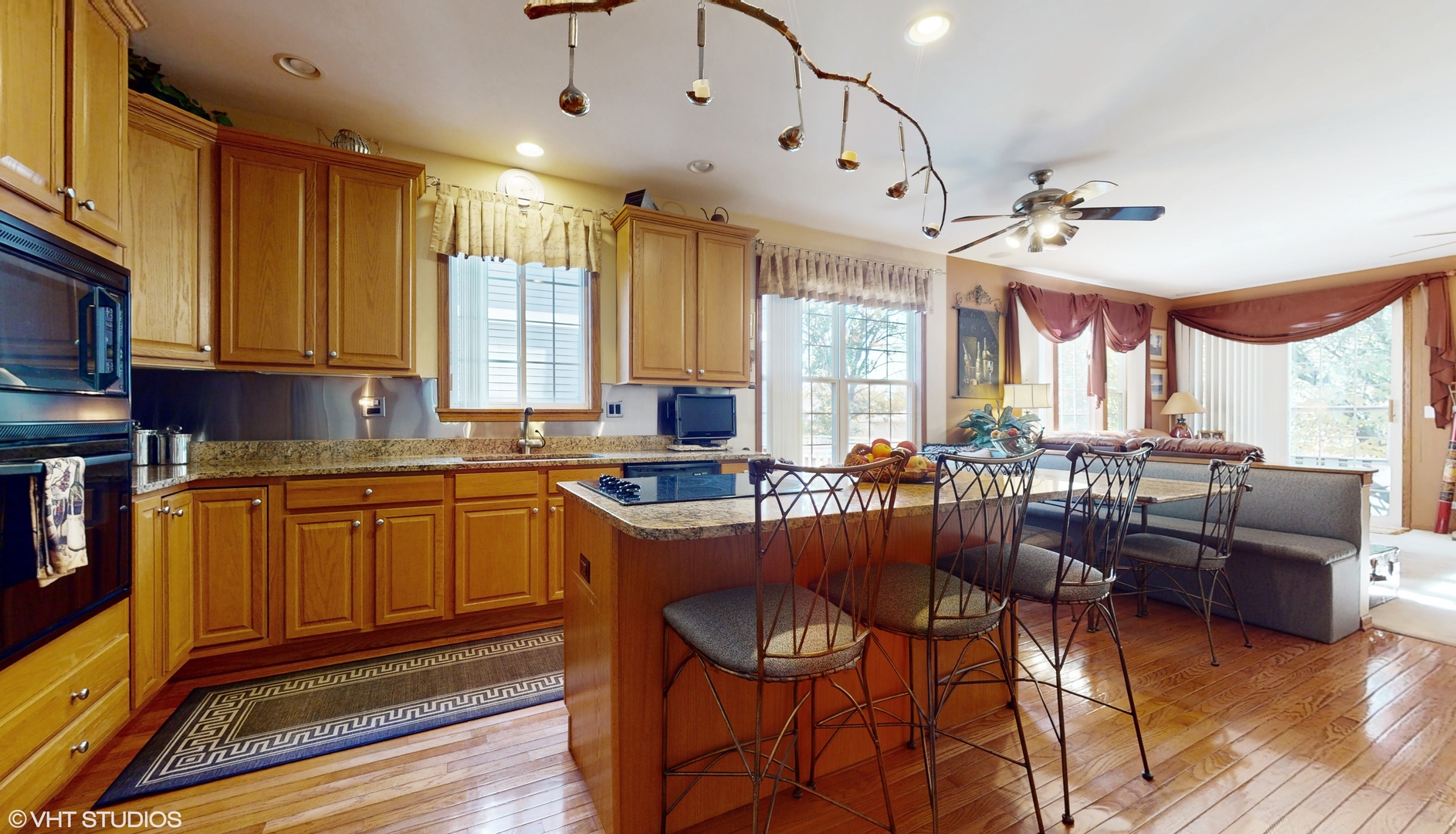 1640 Newton Avenue Park Ridge, IL 60068 - Photo 8 of 50 a very nice looking kitchen with a large window a dining table and chairs
