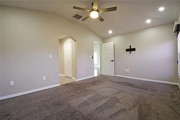a view of an empty room with a window
