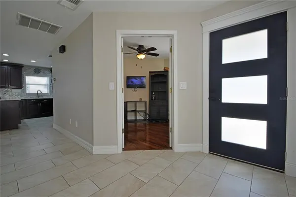 a kitchen with stainless steel appliances a stove and a refrigerator