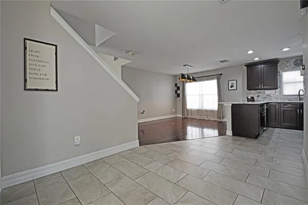 a kitchen with stainless steel appliances granite countertop a sink and stove top oven