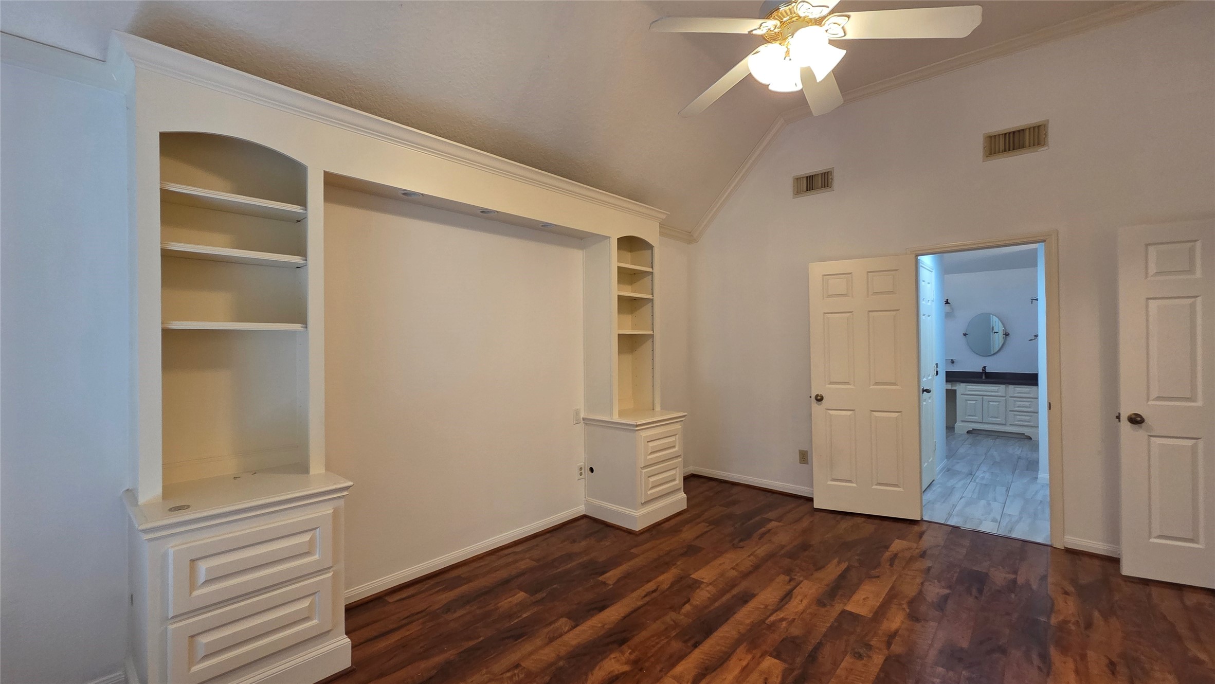 18514 Purdy Court Houston, TX 77084 - Photo 12 of 25 a view of empty room with wooden floor and fan