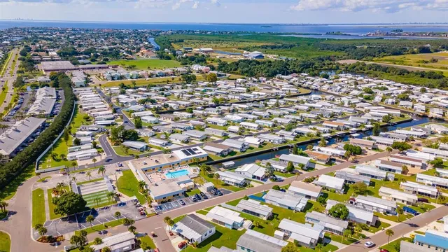 an aerial view of a city with lots of residential buildings