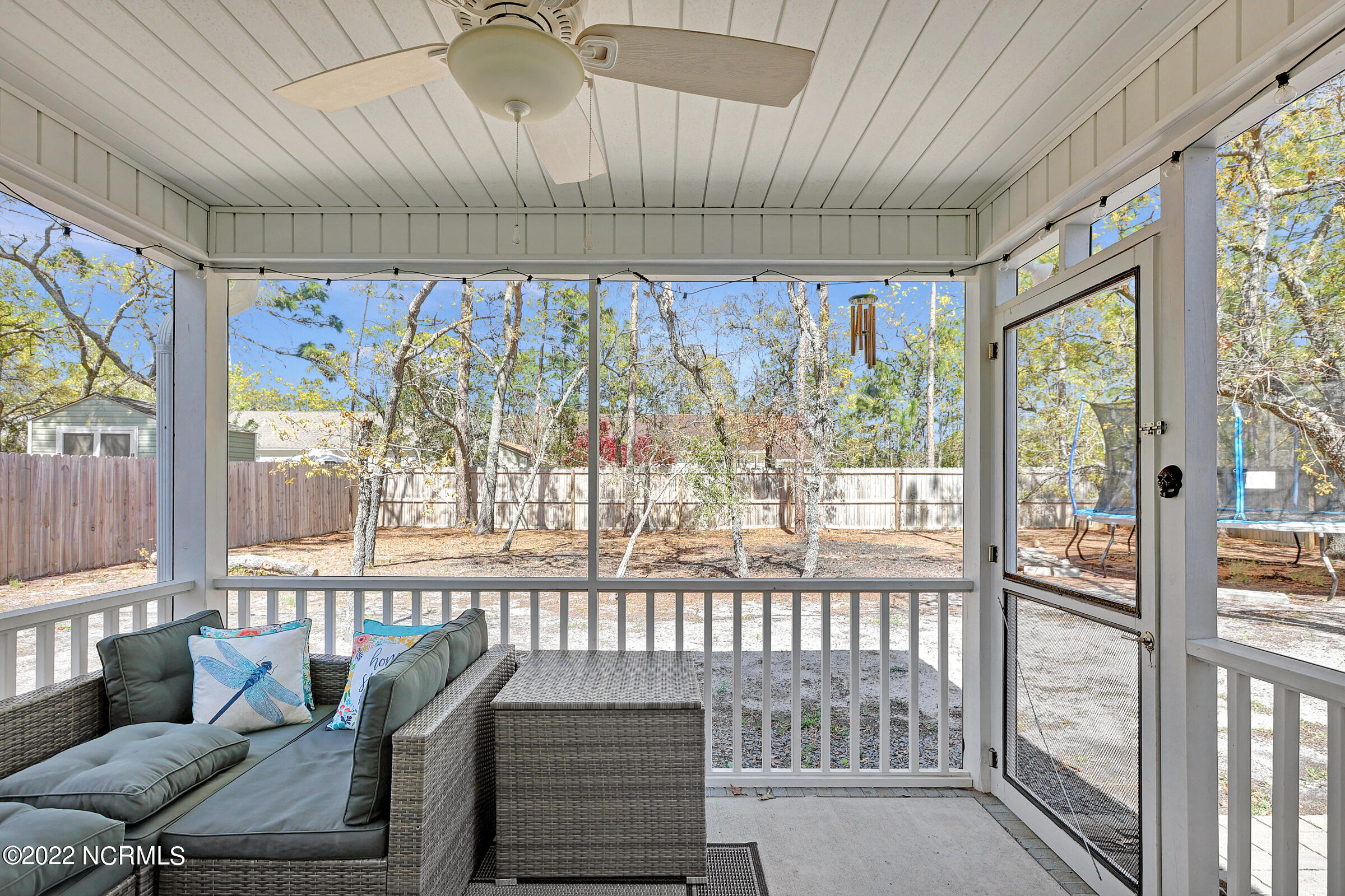 230 Ash Road Southport, NC 28461 - Photo 30 of 37 Rear covered and screened porch.