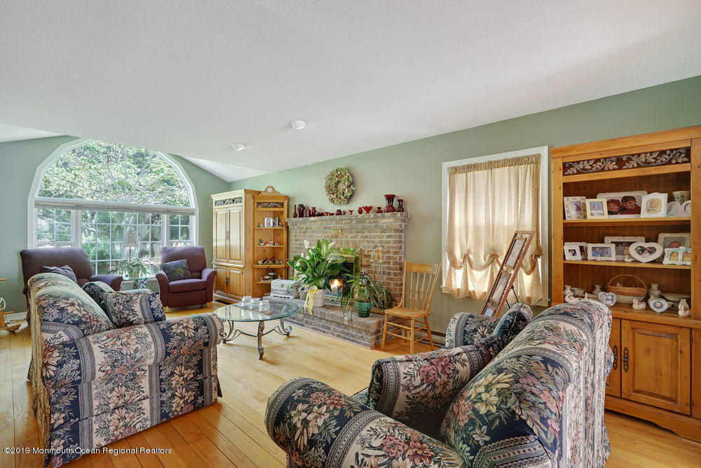 205 Forge Road West Creek, NJ 08092 - Photo 12 of 64 a living room with furniture and a large window