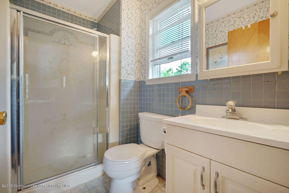 205 Forge Road West Creek, NJ 08092 - Photo 37 of 64 a bathroom with a sink toilet and shower