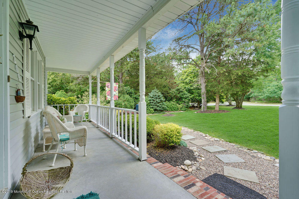205 Forge Road West Creek, NJ 08092 - Photo 4 of 64 a view of a porch with furniture and garden