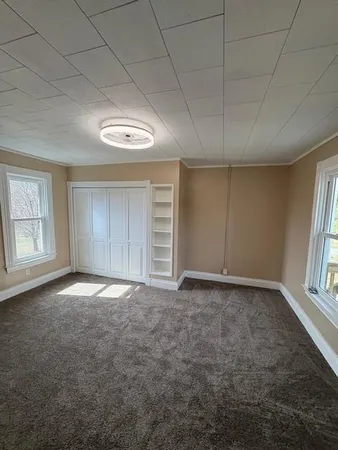 an empty room with windows