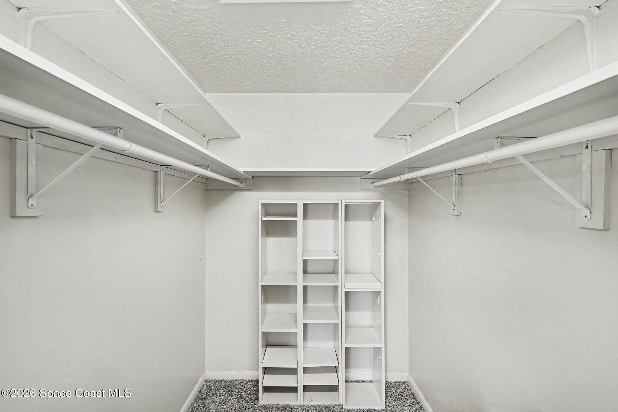 1741 Freedom Drive Melbourne, FL 32940 - Photo 17 of 37 a view of an empty room with a window